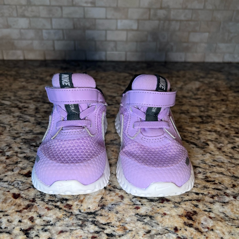 Purple Nike Revolution toddler sneakers